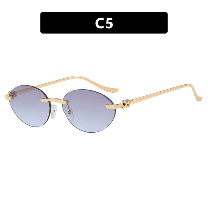 Women's elegant oval sunglasses with golden accents Stornfield