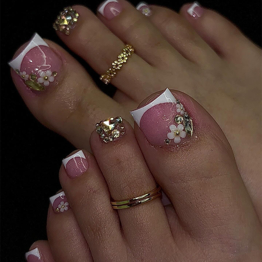 Acrylic nail set with elegant 3D flowers and glitter accents Stornfield