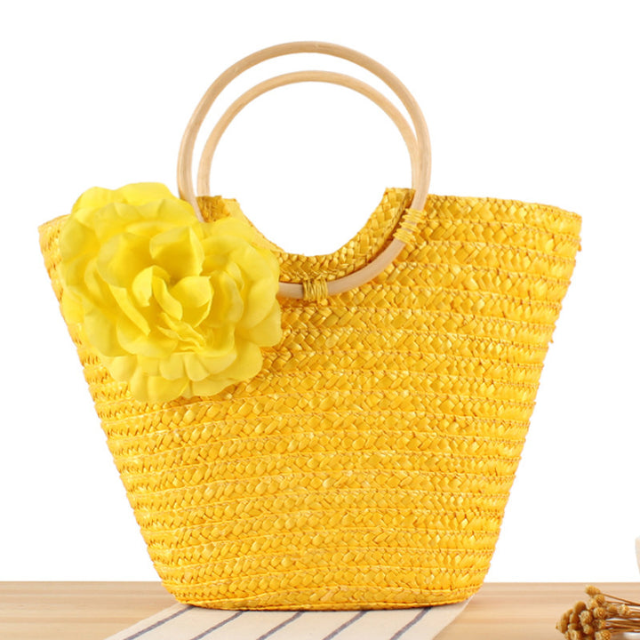 Braided straw bag with floral accent Stornfield