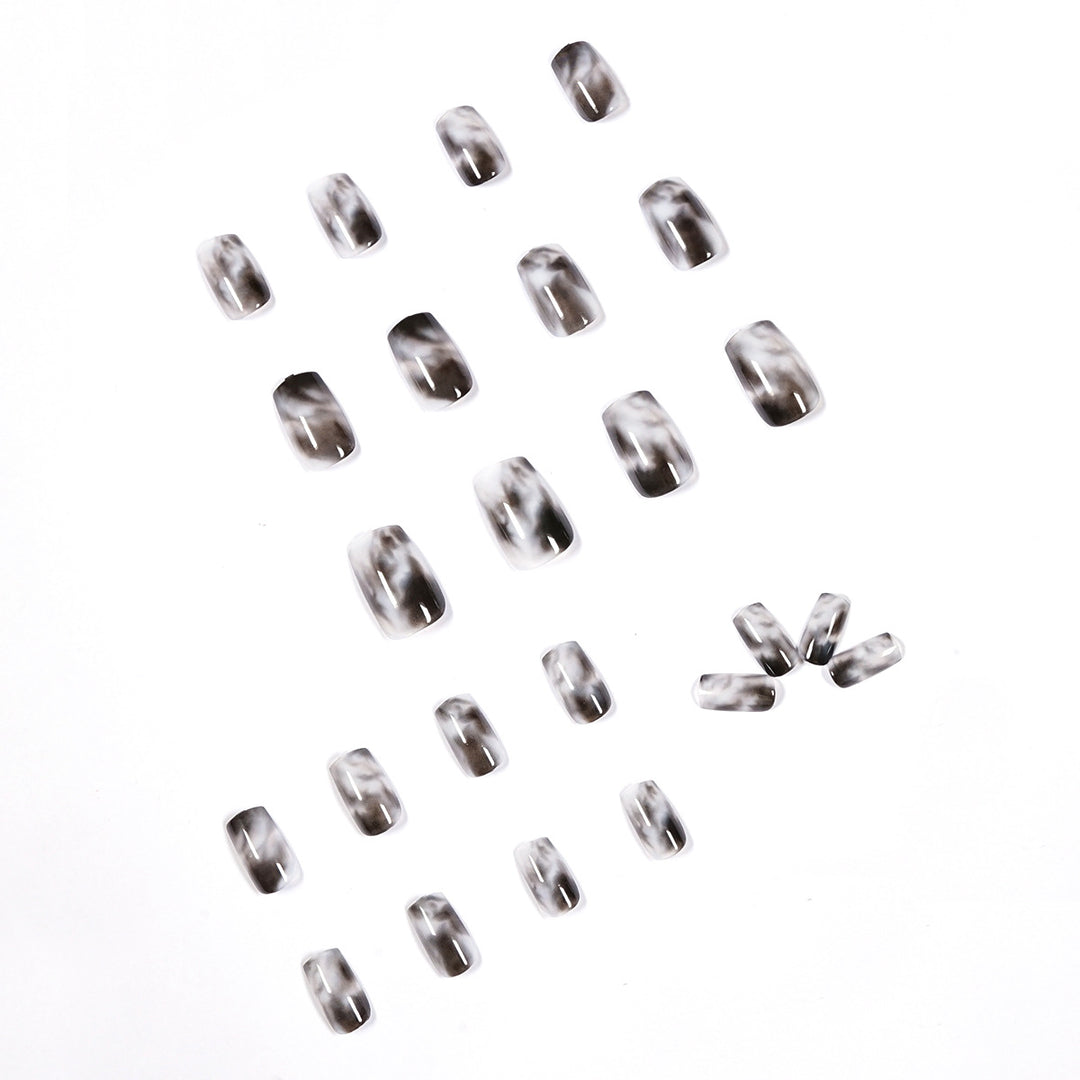 Artful Nail Extensions with Elegant Marble Design Stornfield