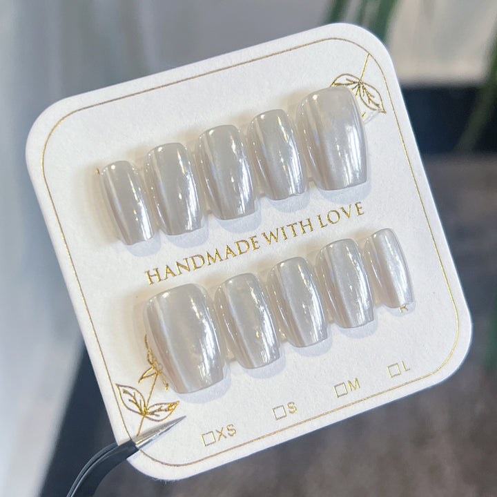 Artificial nail art with shiny surface Stornfield