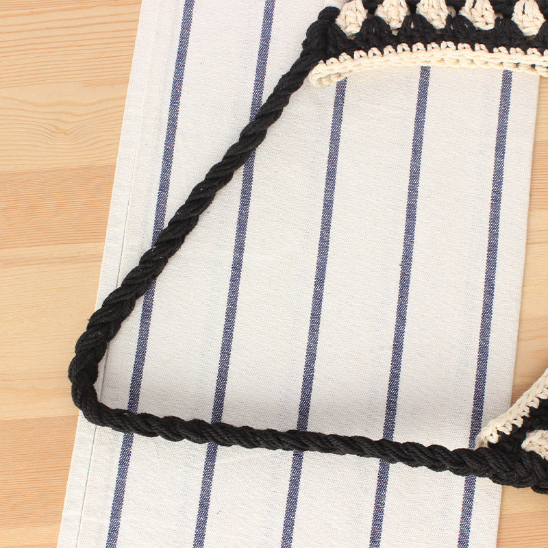 Handbag with artistic macrame design and durable inner bag Stornfield