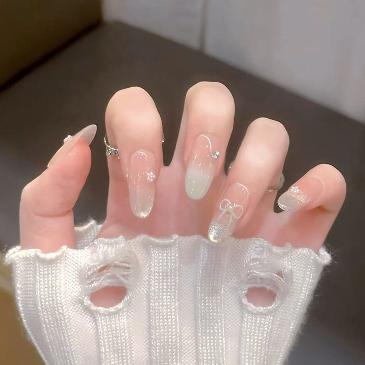Artistic Press-On Nail Set with Bow and Floral Details Stornfield