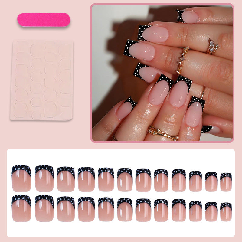 Artificial nail set with elegant black and white accents Stornfield