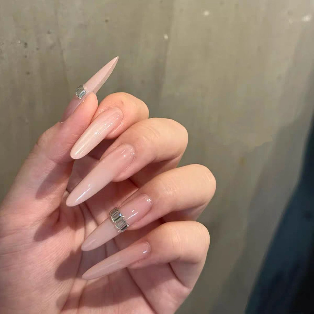 Elegant Stiletto Nail Extensions with Crystal Accents