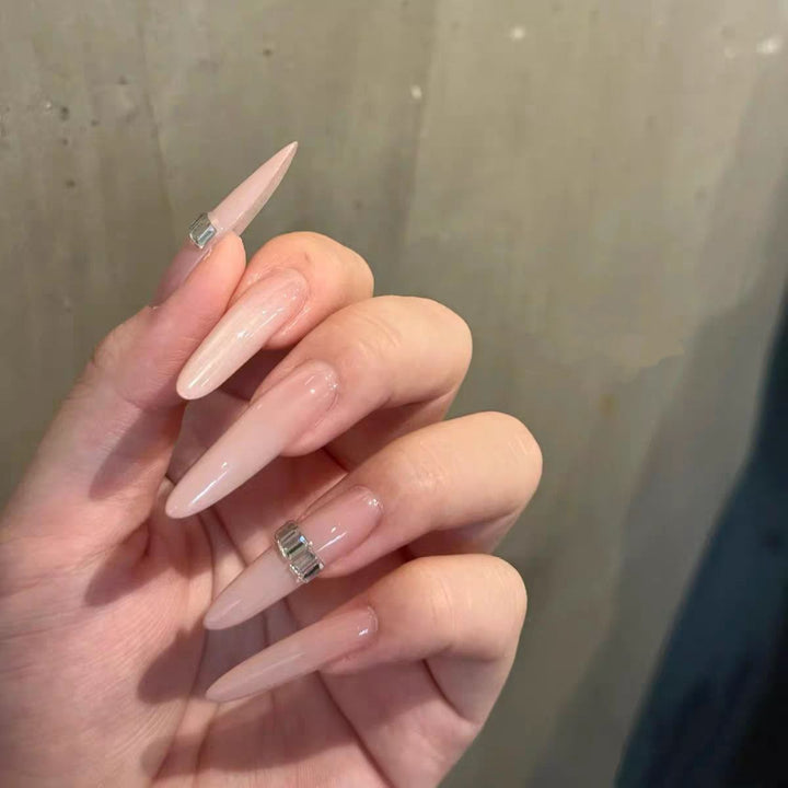 Elegant Stiletto Nail Extensions with Crystal Accents