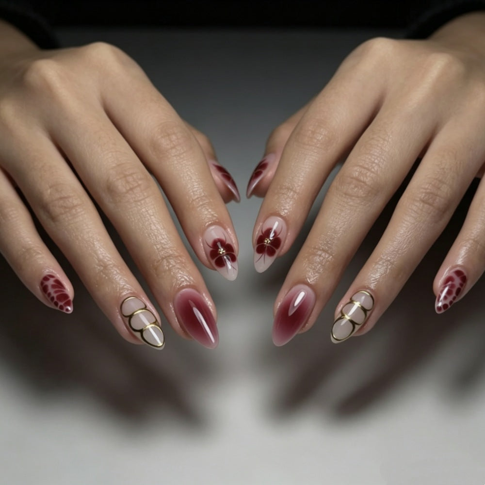 Artificial nails with elaborate flower designs and elegant accents Stornfield
