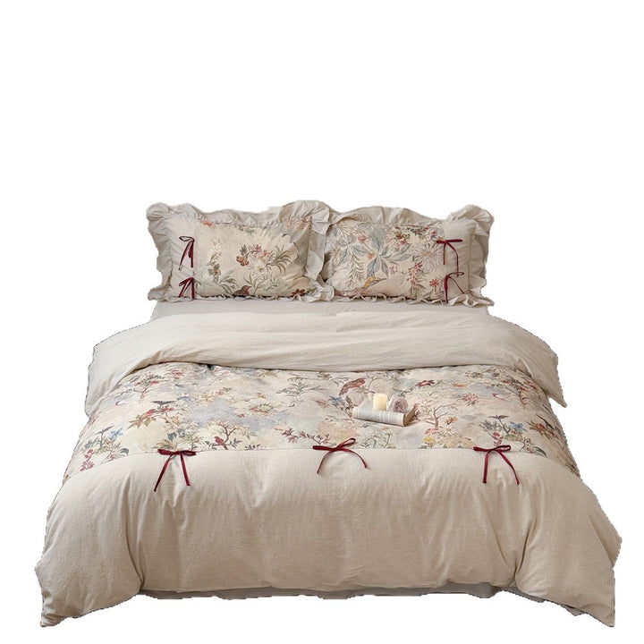 Bedding set with floral vintage linen look, ruffled pillow and bow tie