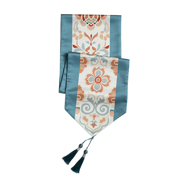 Decorative table runner with oriental tile pattern and tassels Stornfield