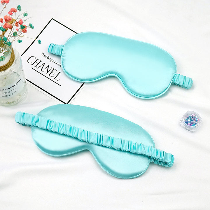 Women's breathable satin eye mask with ergonomic curvature, soft padding and gathered anti-slip band Stornfield