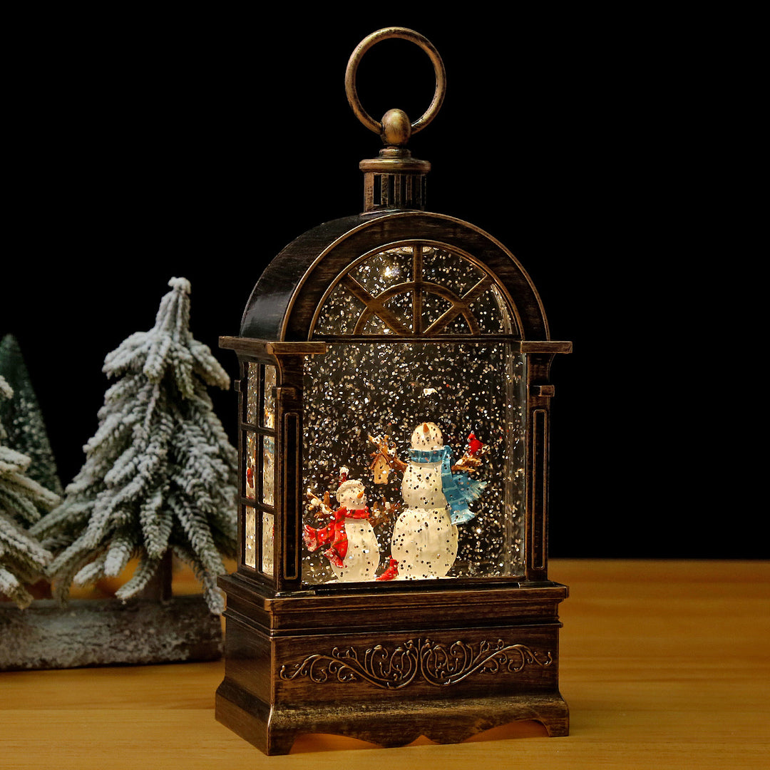 Illuminated Christmas lantern with snow and Christmas motif Stornfield