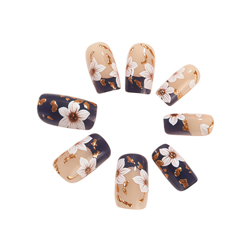 Artificial nails with floral accents and glamour effects Stornfield