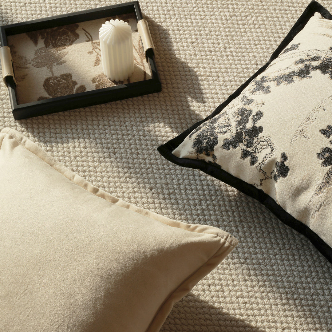 Elegant decorative pillow with intricate landscape illustration