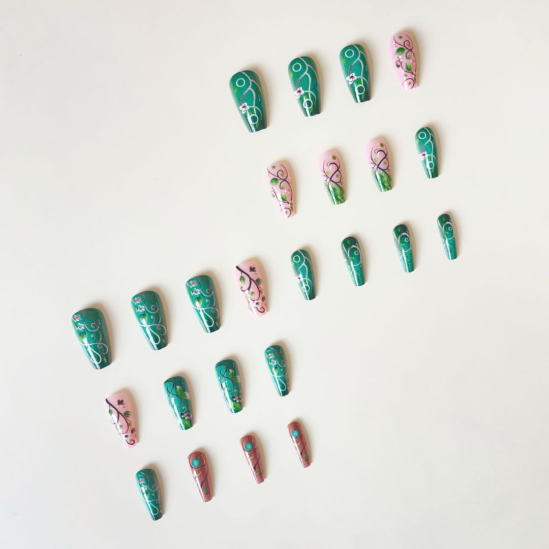 luxurious artificial nail set with floral designs and detailed accents Stornfield