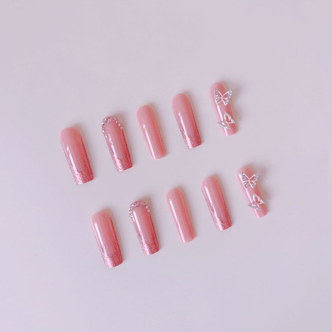 Nail set with sparkling glitter effects and elegant 3D decorations Stornfield