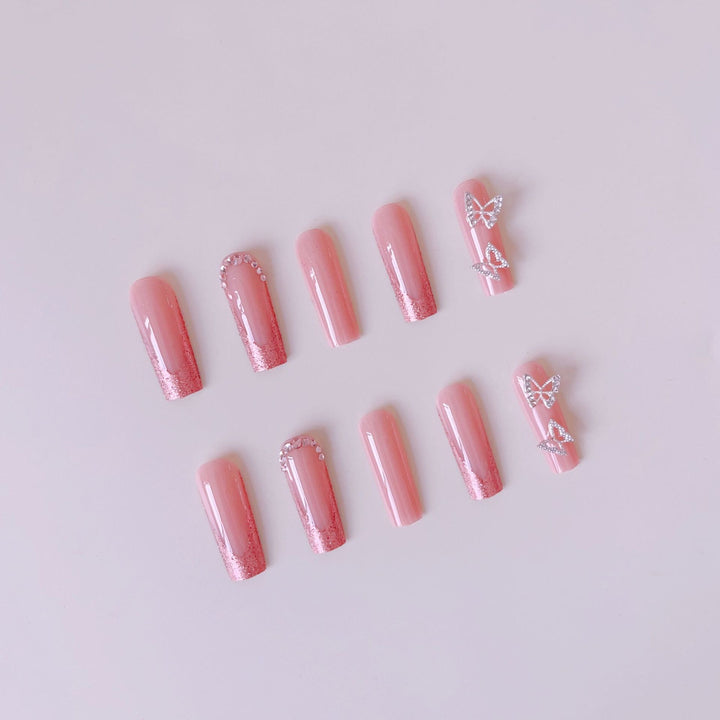 Nail set with sparkling glitter effects and elegant 3D decorations Stornfield