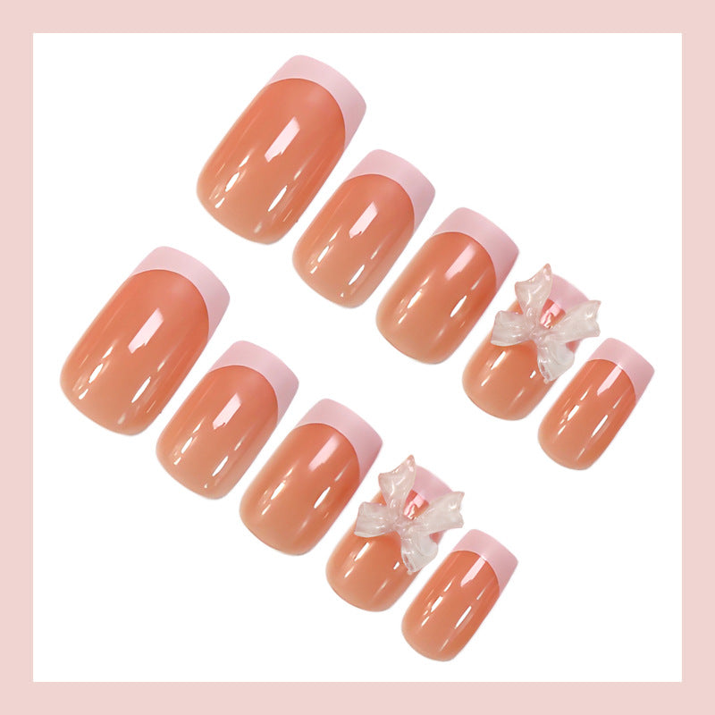 Artificial Nail Set with Romantic Bows and French Tip Stornfield