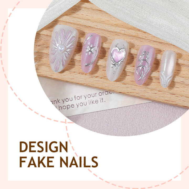 Acrylic nail set with floral accents and glitter embellishments Stornfield