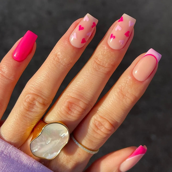 Elegant Heart-Embellished Nail Art Design Stornfield