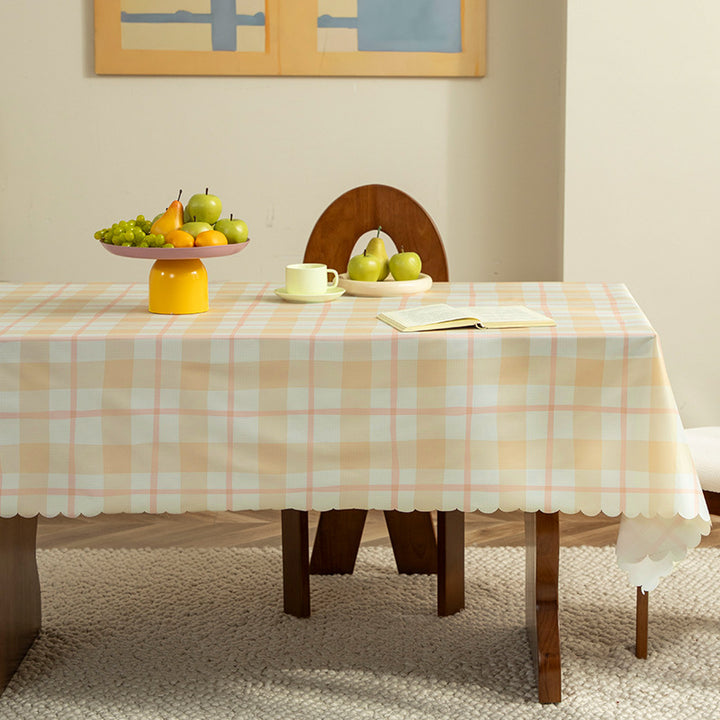 Wipeable tablecloth with star pattern and wavy hem Stornfield