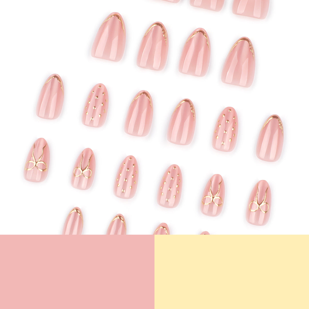 Artful nail extensions with elegant golden accents Stornfield
