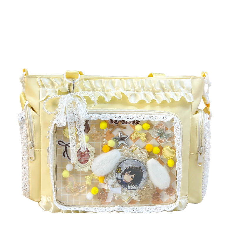 Shoulder bag with transparent front and playful applications Stornfield
