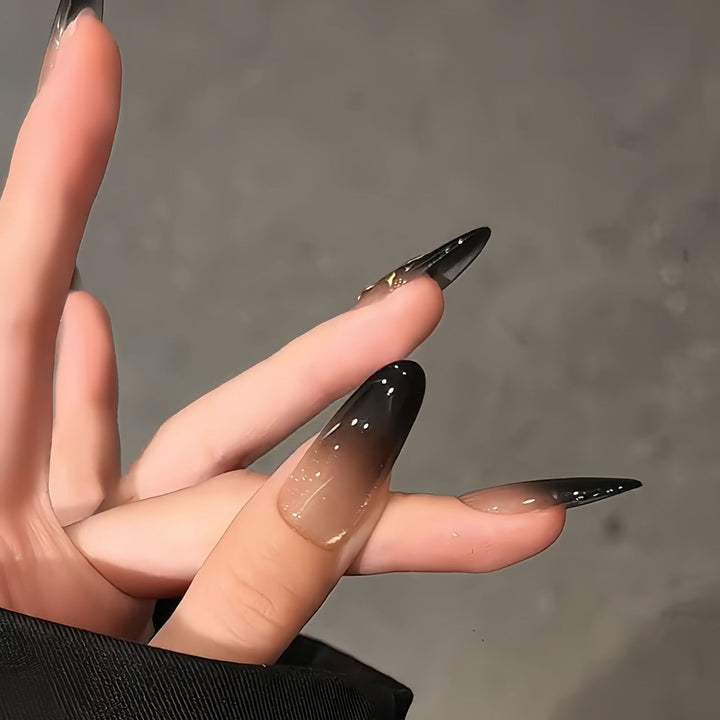 Glamorous artificial nails with intricate flower and glitter effects Stornfield
