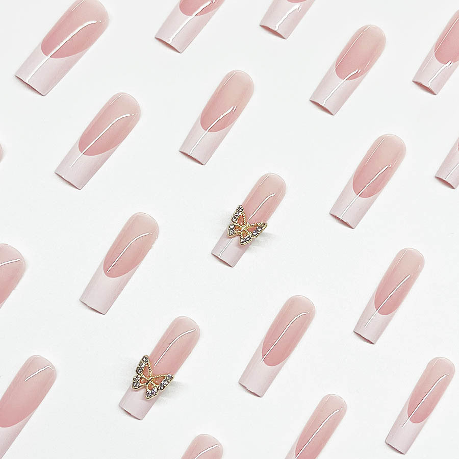 Elegant artificial nail set with butterfly accents Stornfield