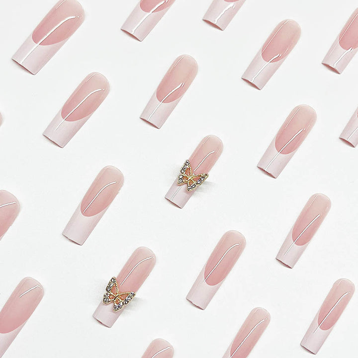 Elegant artificial nail set with butterfly accents Stornfield