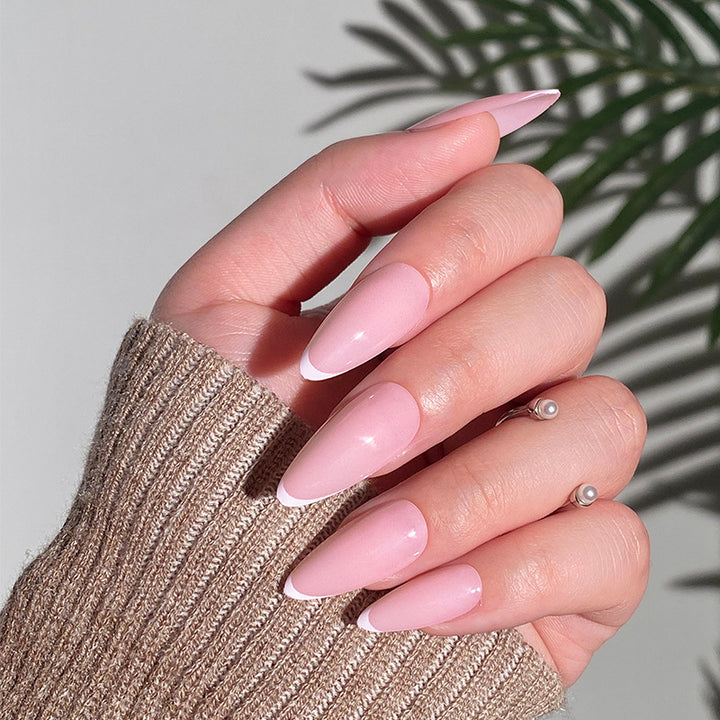 Artistic Stiletto Nails with Elegant French Tip Design Stornfield