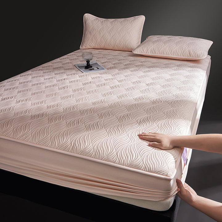 Quilted mattress topper as fitted cover with non-slip underside