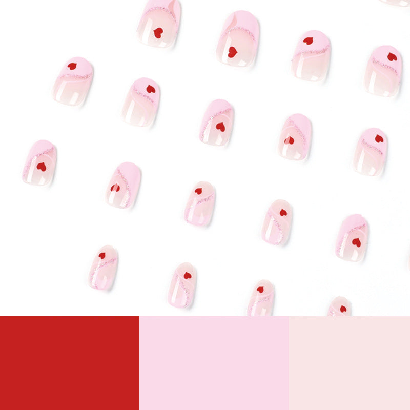 Artistic Nail Extensions with Heart Motif Stornfield