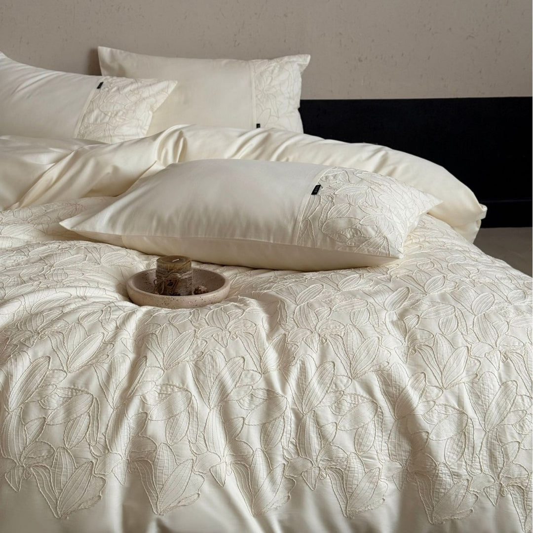 Luxurious cotton satin bedding set with embroidered leaf relief