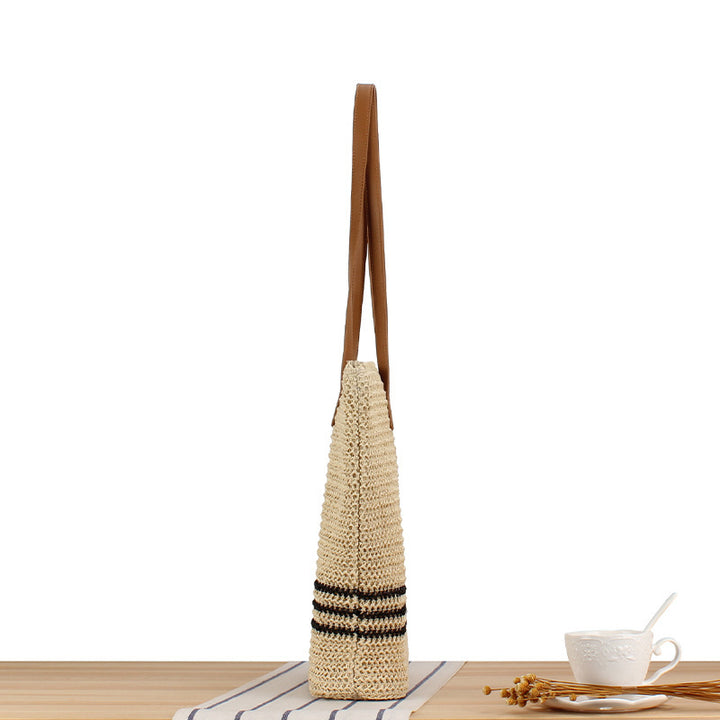 Stylish beach bag made of natural weave with leather handles Stornfield