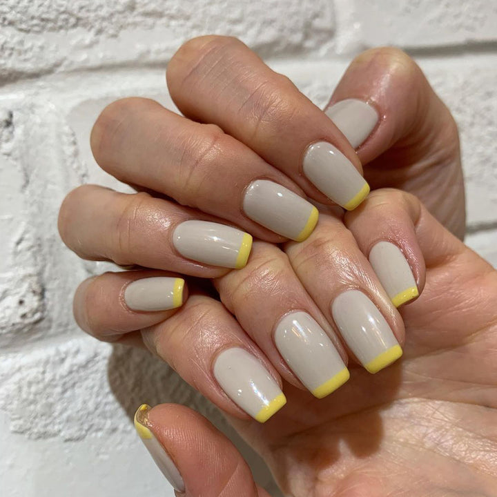 Artistic nail extensions with modern French-tip design Stornfield