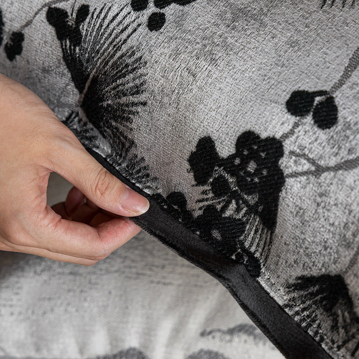 Decorative pillow with mountain motifs