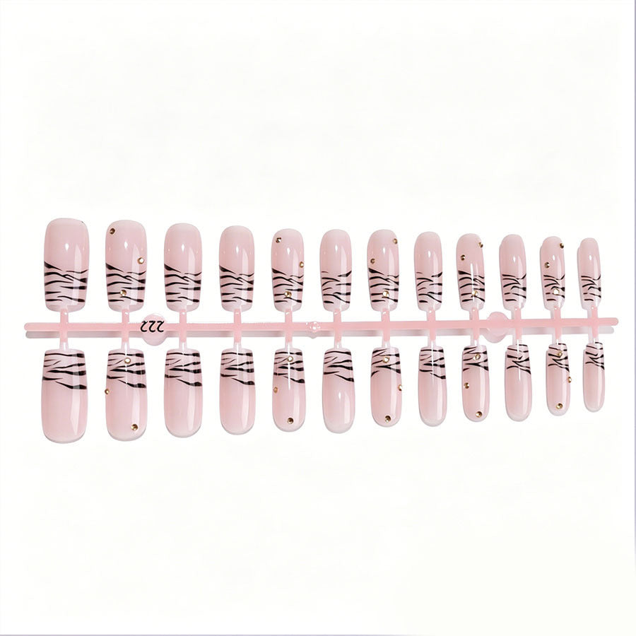 Art nail set with elegant lines and glitter accents Stornfield