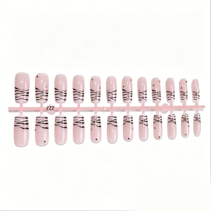 Art nail set with elegant lines and glitter accents Stornfield