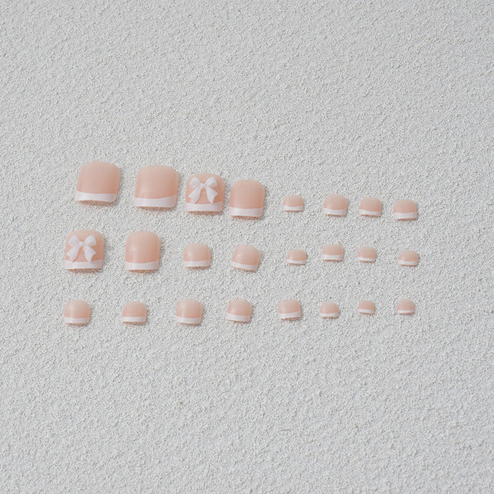 Artificial nail set with romantic bow motifs Stornfield