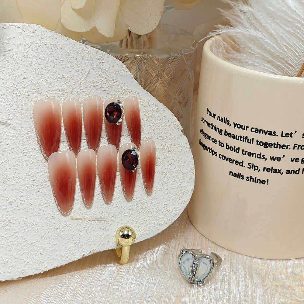 Glittering artificial nails with elegant tip design and crystal decoration Stornfield