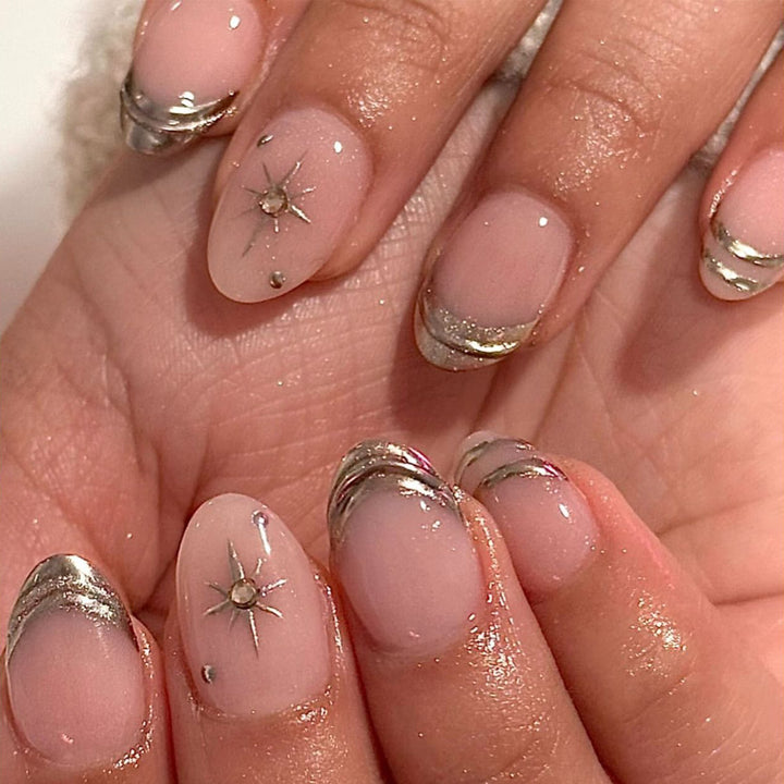 Glamorous nail extensions with elegant metallic accents Stornfield