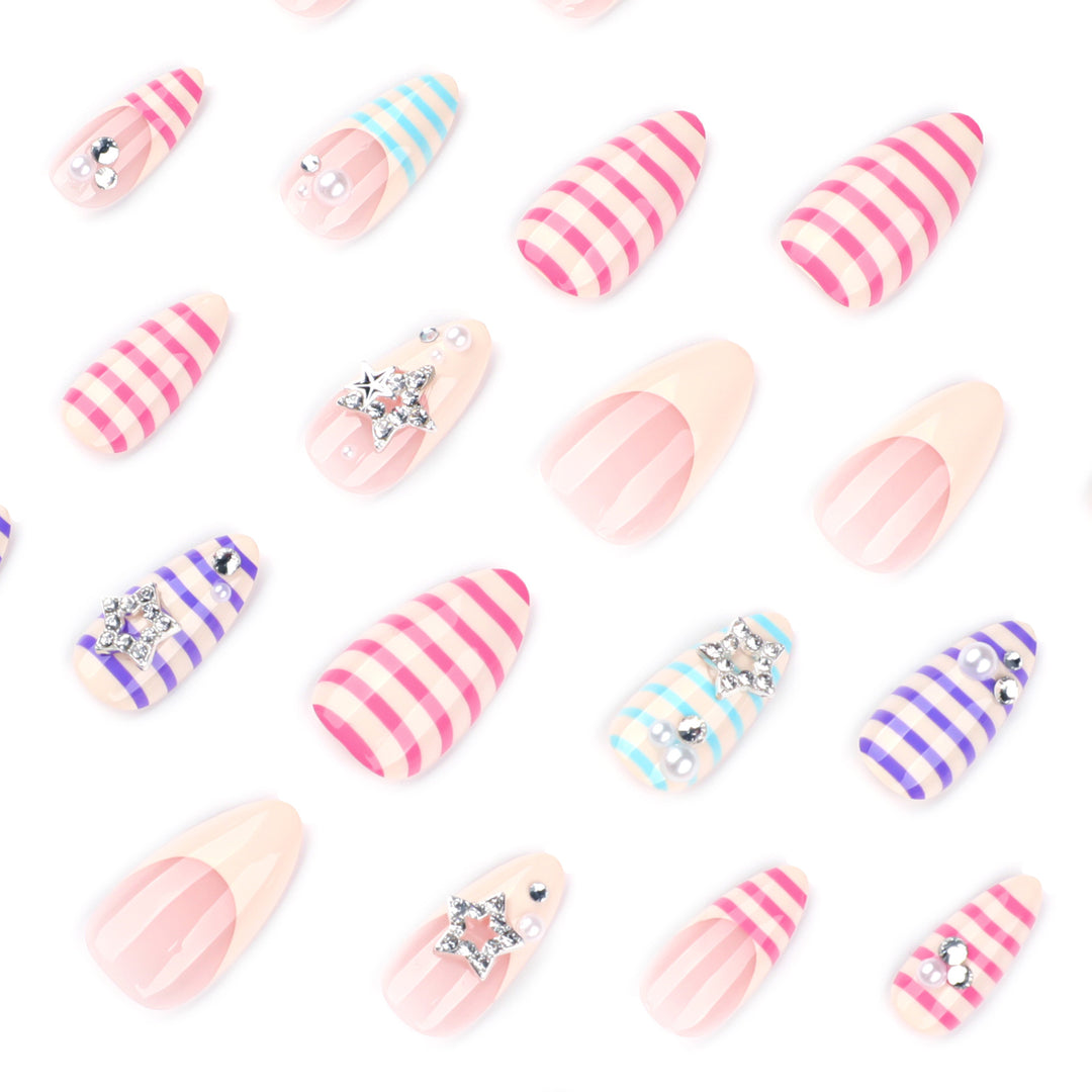 Artistic acrylic stiletto nails with glitter and star embellishments Stornfield