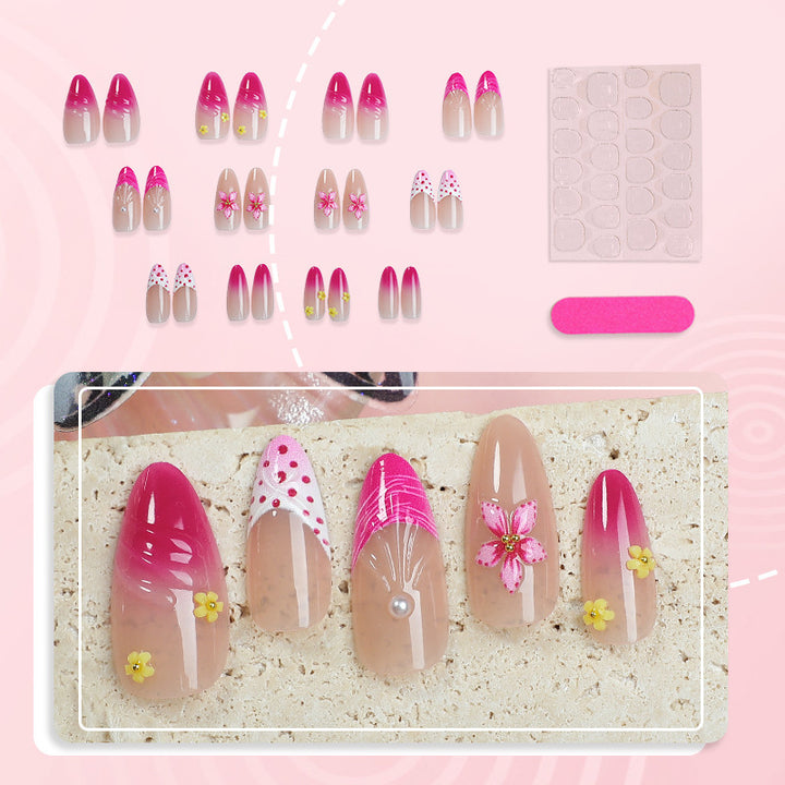 Artful nail tips with delicate floral embellishments Stornfield