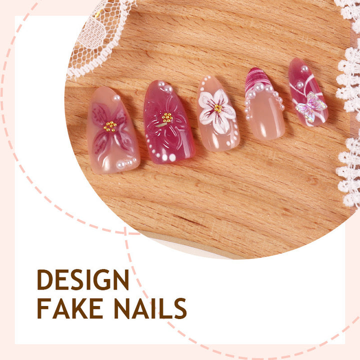 Artificial nail set with floral designs and 3D decorations Stornfield