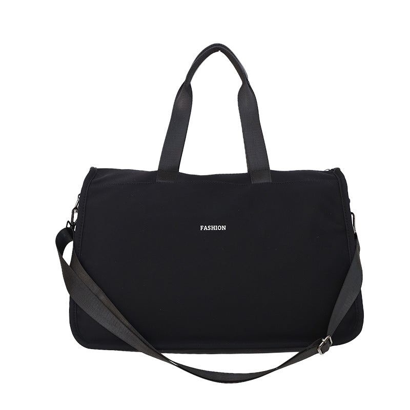 Sporty travel bag with ergonomic carrying handles and versatile compartments Stornfield