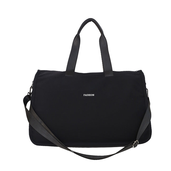 Sporty travel bag with ergonomic carrying handles and versatile compartments Stornfield
