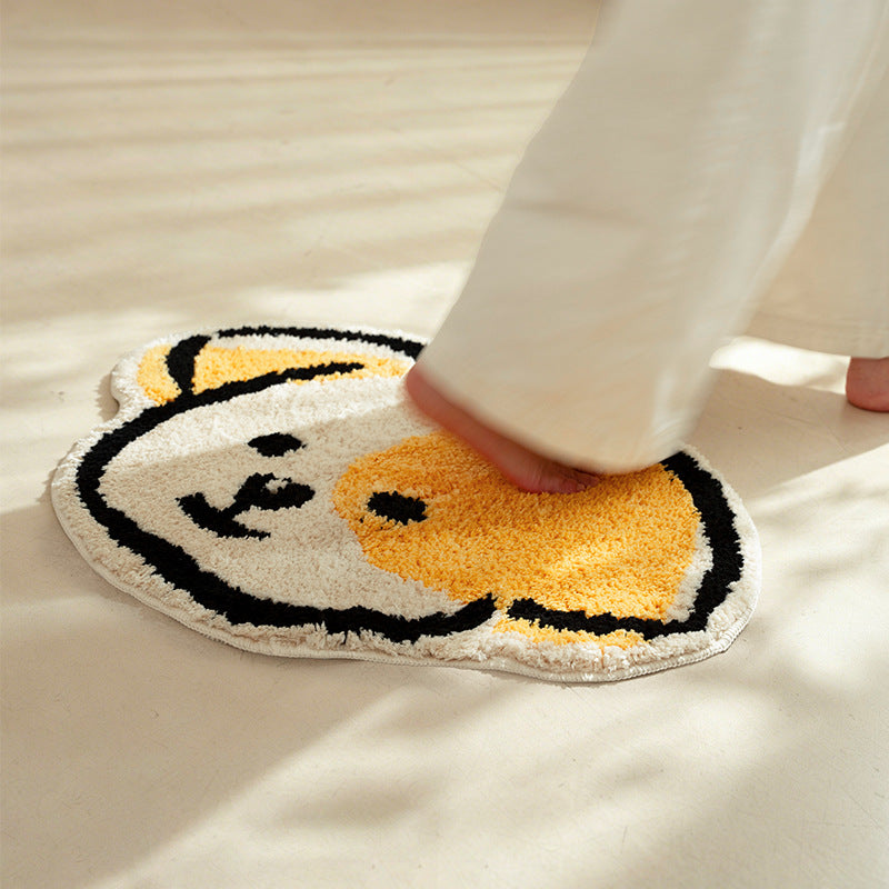 Playful children's rug in cheese shape with tufted chenille surface and non-slip backing Stornfield