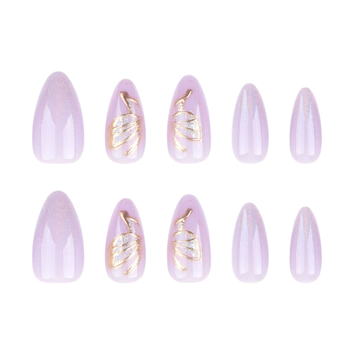 Glamorous artificial nails with rhinestone and glitter decorations Stornfield