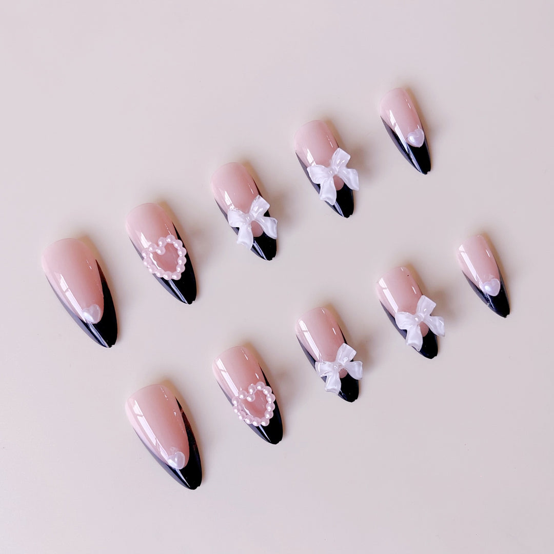 Glamorous artificial nail tips with 3D bows and heart decorations Stornfield