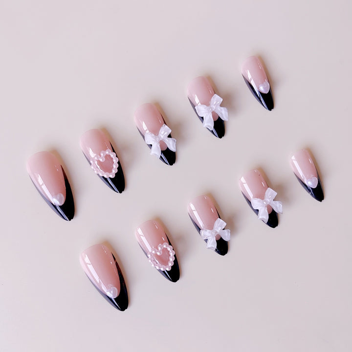 Glamorous artificial nail tips with 3D bows and heart decorations Stornfield